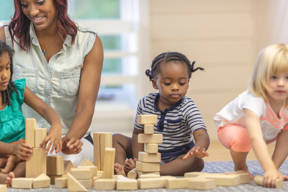 Preschool children playing with blocks