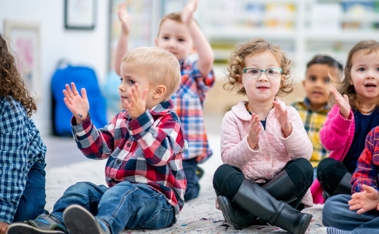 Preschool Children Singing During Circle Time